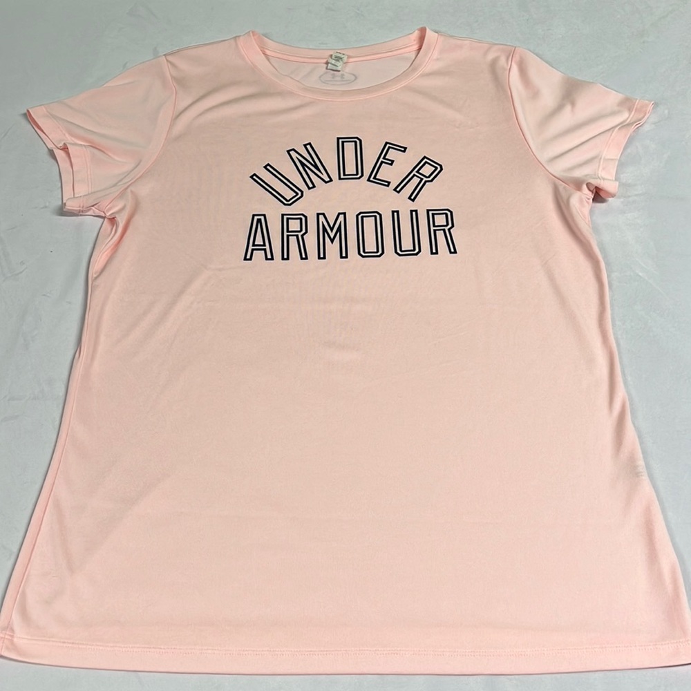 Woman’s pink heat gear Under Armour t-shirt